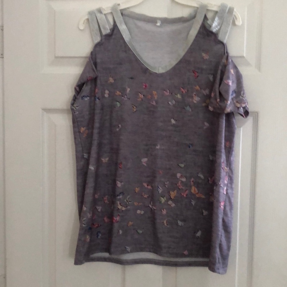 Very pretty top with 3 straps on top never worn